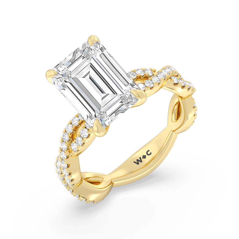 Magnificient Twist Ring with Emerald Cut Diamond in 14KT Yellow Gold view 3

