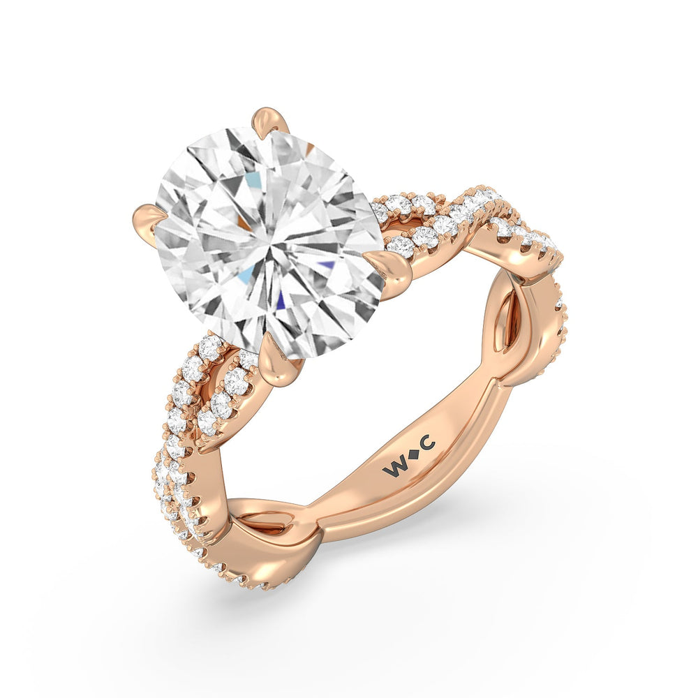 Magnificient Twist Ring with Oval Cut Diamond in 14KT Rose Gold view 3
