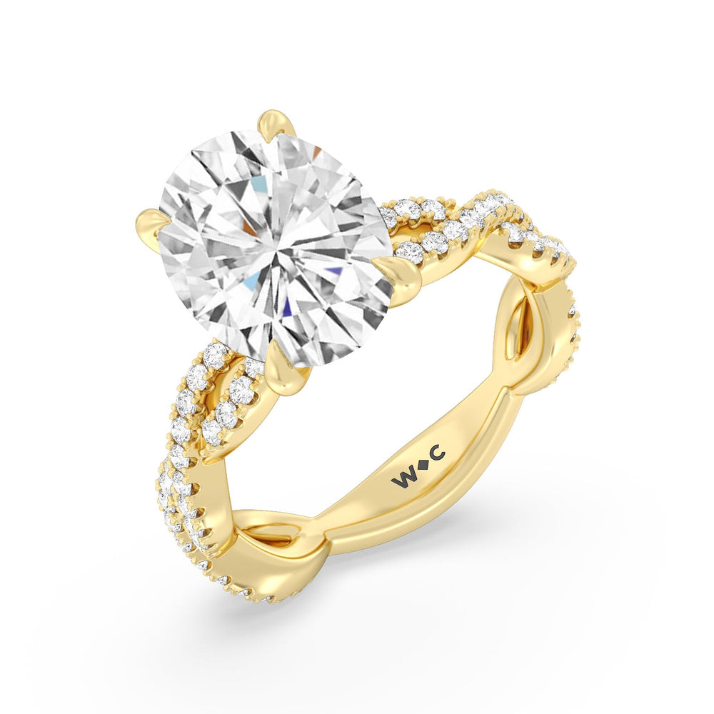 Magnificient Twist Ring with Oval Cut Diamond in 14KT Yellow Gold view 3

