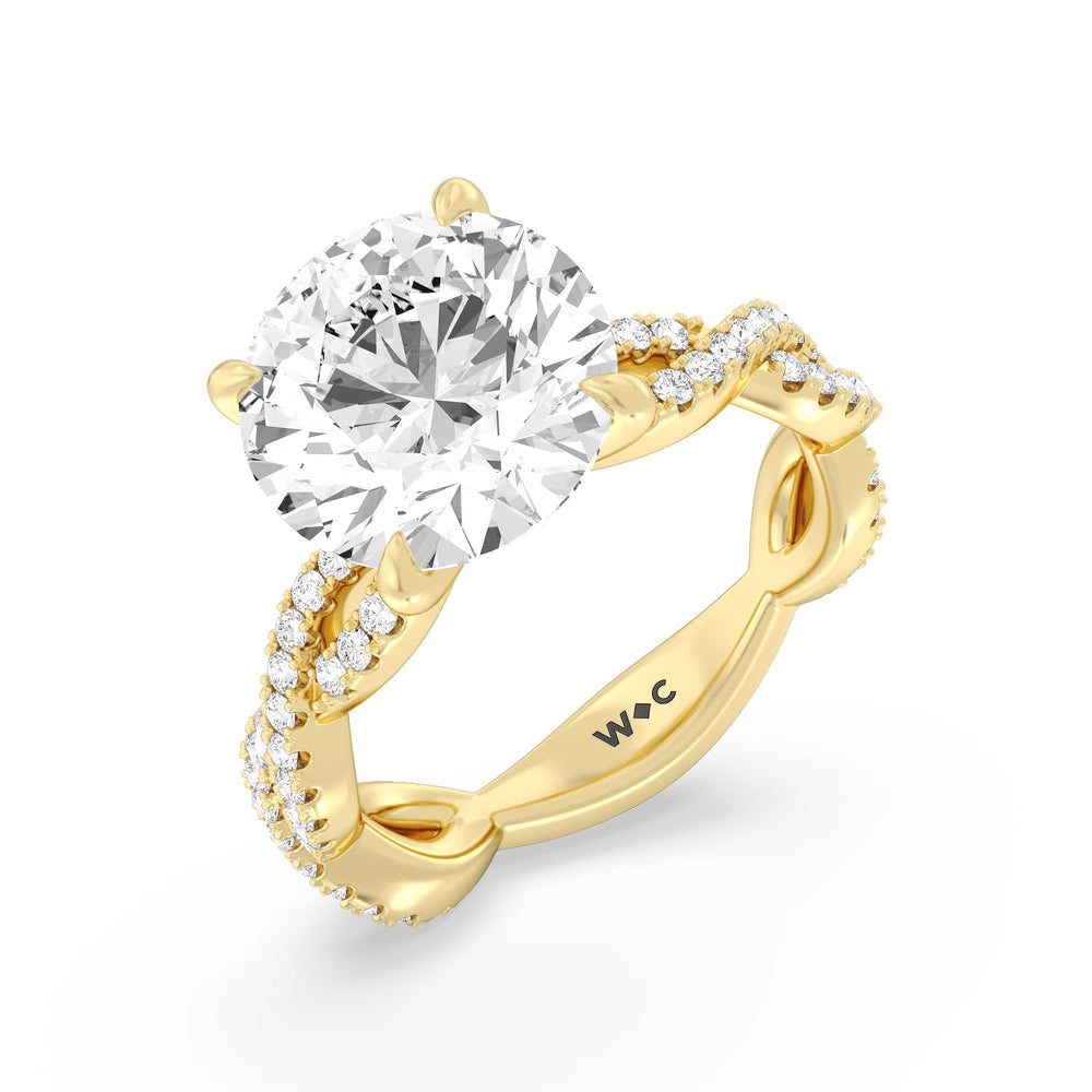 Magnificient Twist Ring with Round Cut Diamond in 14KT Yellow Gold view 3
