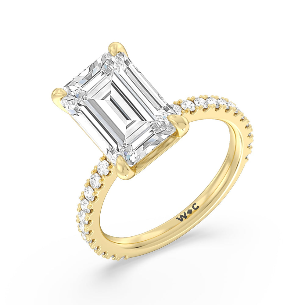 Illustrious Half Pave Ring with Emerald Cut Diamond in 14KT Yellow Gold view 3
