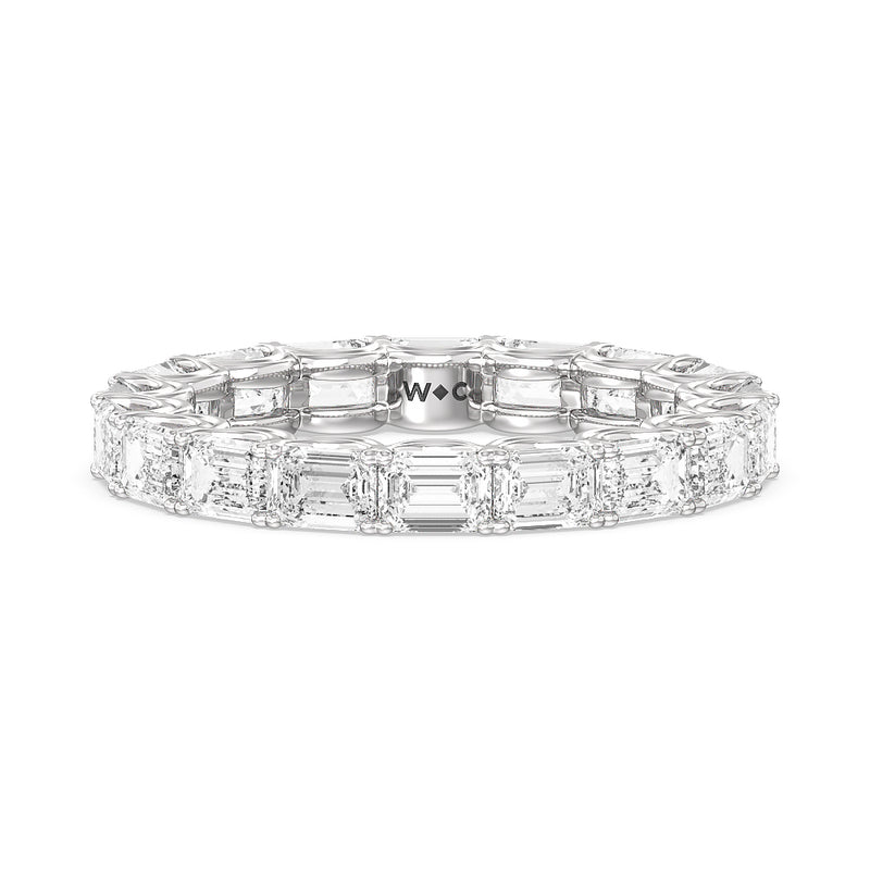 Emerald Split Prong Waves Eternity Ring