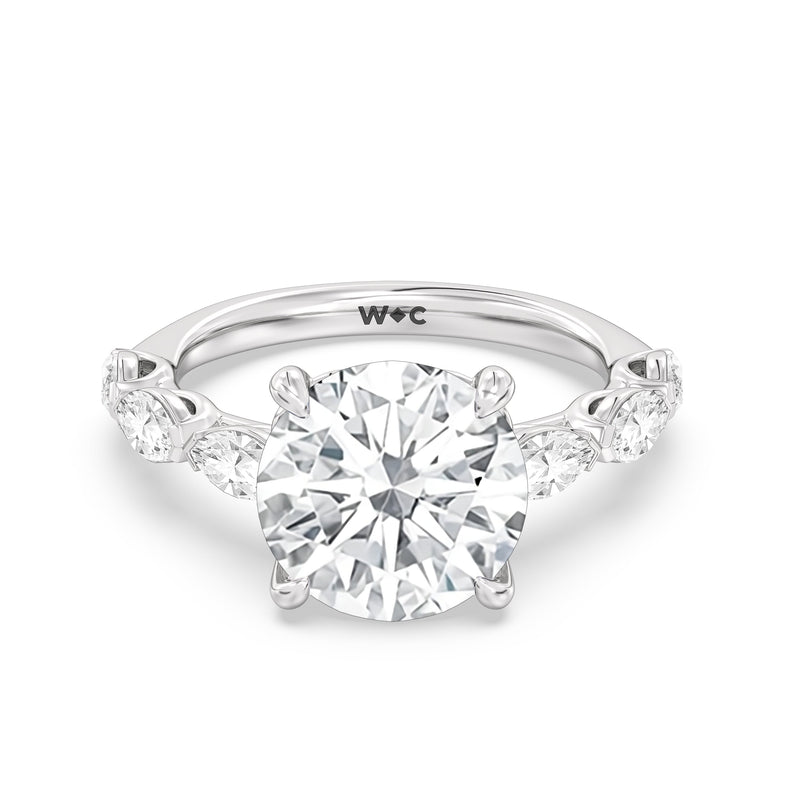 Elegance Marquise Accent Studded Engagement Ring
