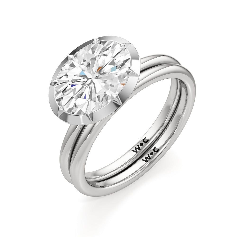 The Élodie Engagement Ring with West Emerald Cut Diamond in 14KT Platinum view 4
