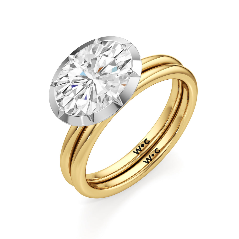 The Élodie Engagement Ring with West Emerald Cut Diamond in 14KT Yellow & White Gold view 4
