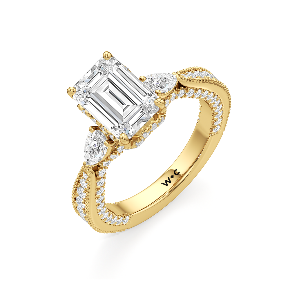 The Chrysler Pear Three Stone Ring with Emerald Cut Diamond in 14KT Yellow Gold view 3
