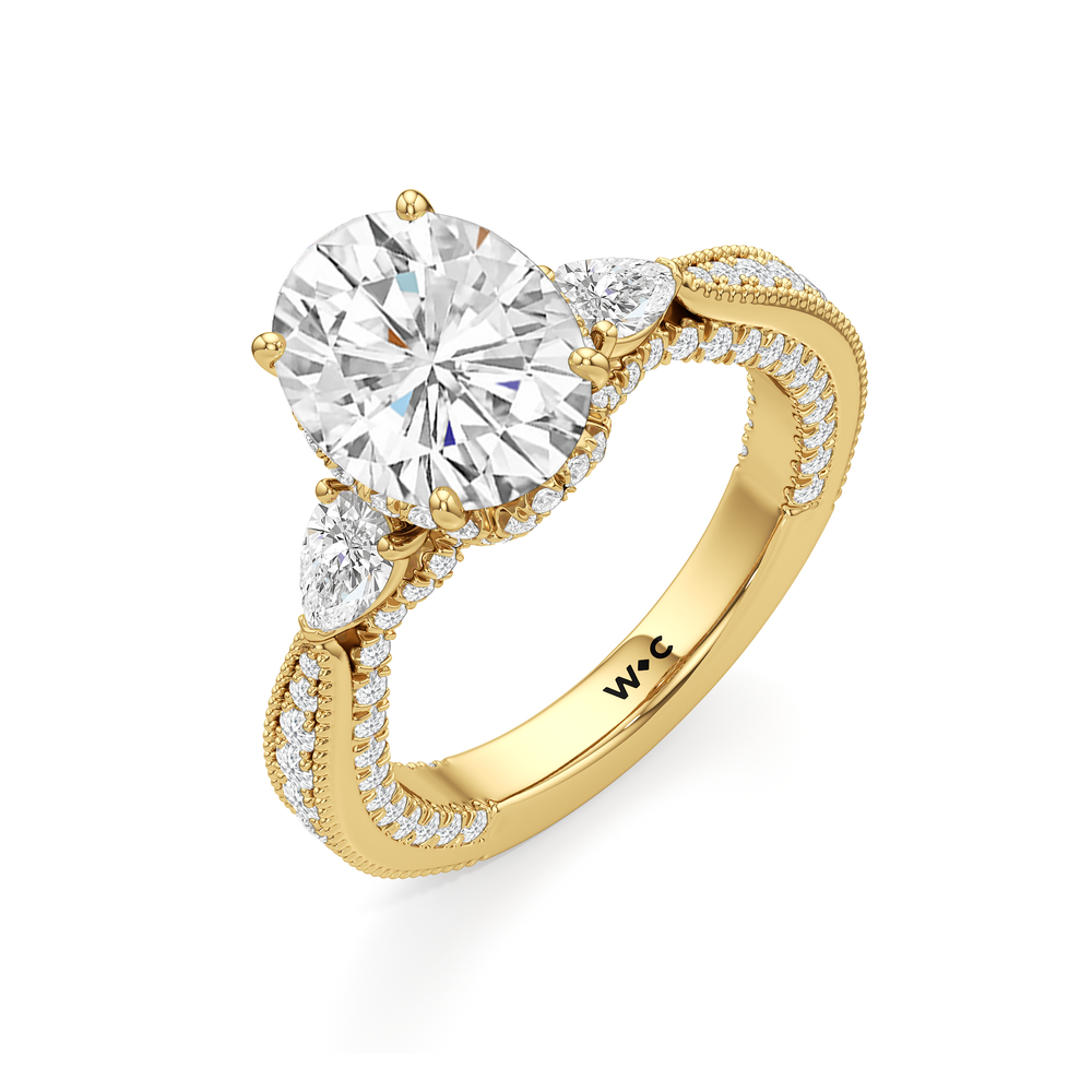 The Chrysler Pear Three Stone Ring with Oval Cut Diamond in 14KT Yellow Gold view 3
