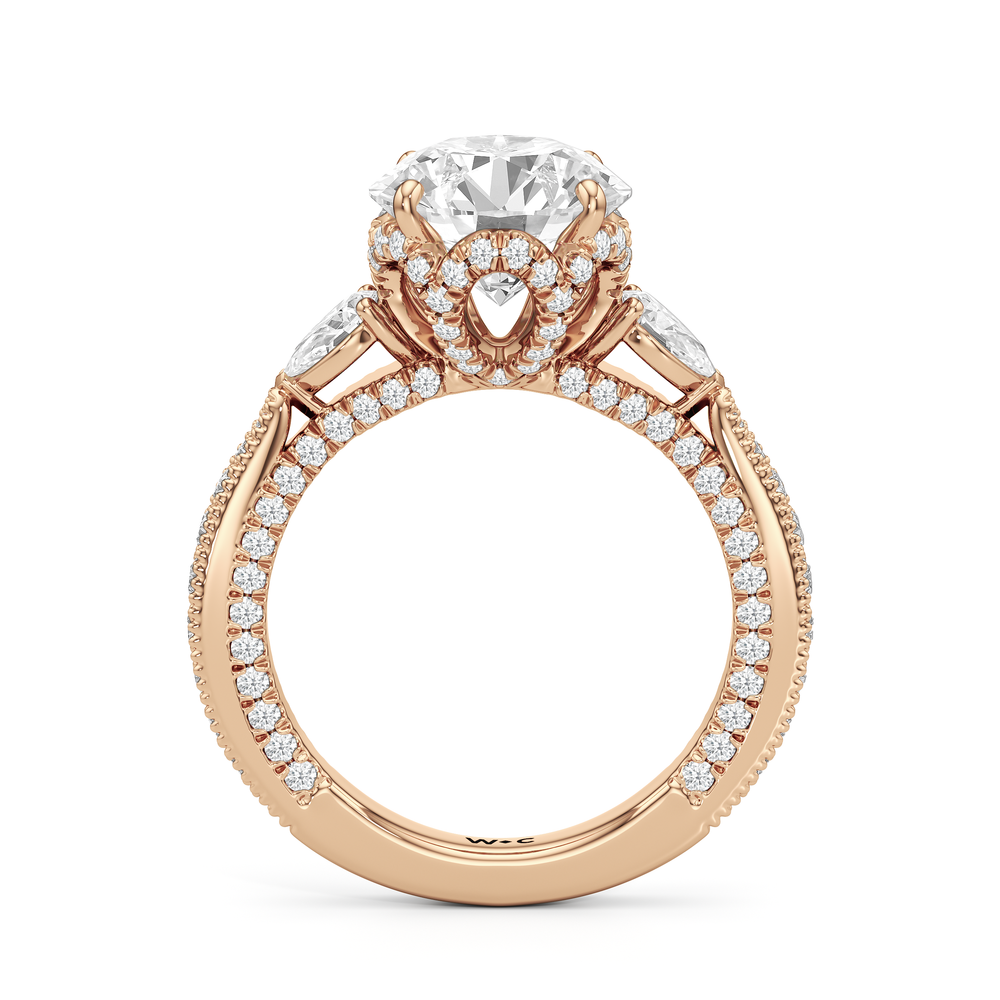 The Chrysler Pear Three Stone Ring with Round Cut Diamond in 14KT Rose Gold view 3
