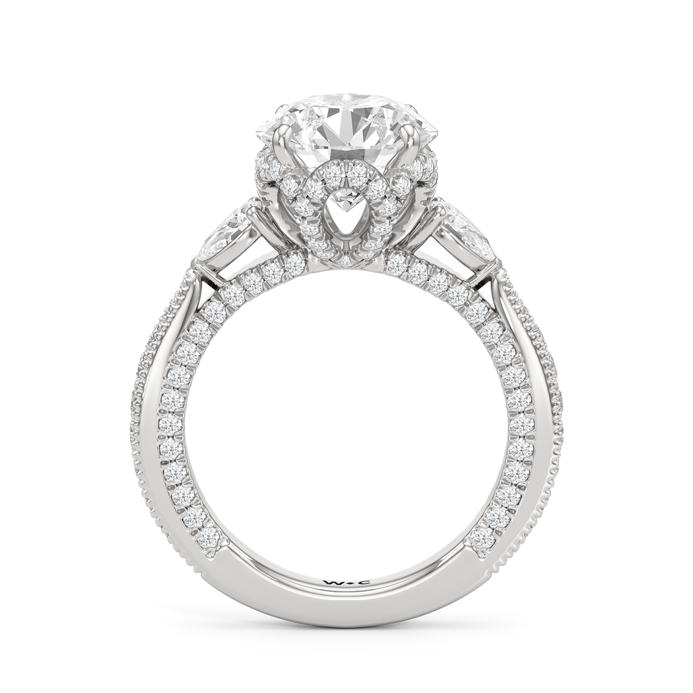 The Chrysler Pear Three Stone Ring with Round Cut Diamond in 14KT Platinum view 2
