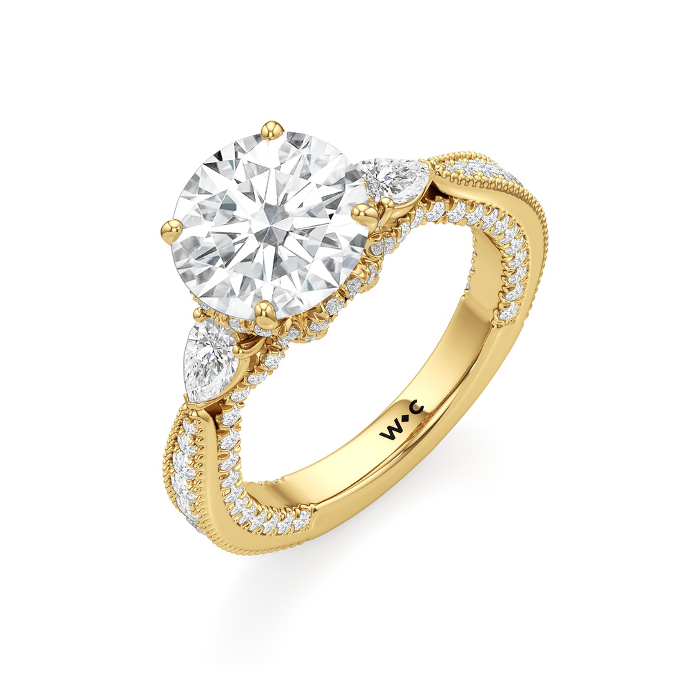 The Chrysler Pear Three Stone Ring with Round Cut Diamond in 14KT Yellow Gold view 2
