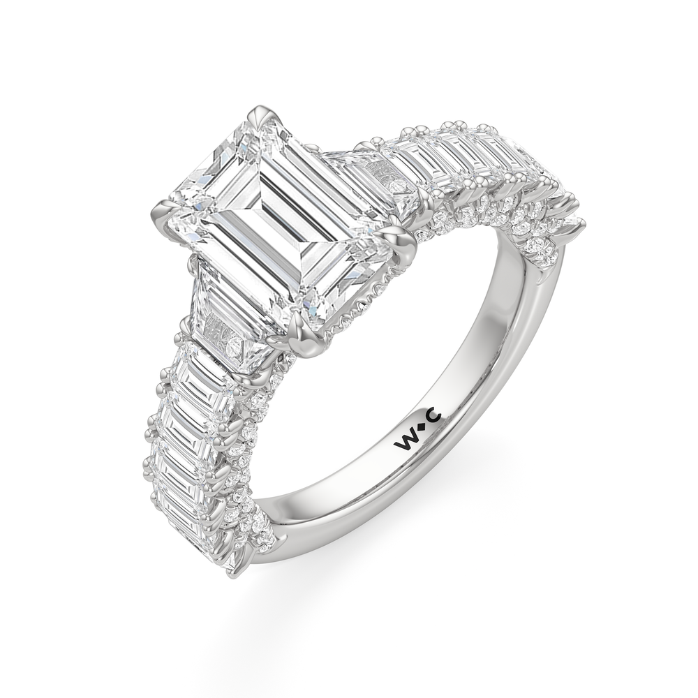 The Roosevelt Three Stone Trapezoid Ring with Emerald Cut Diamond in 14KT Platinum view 4
