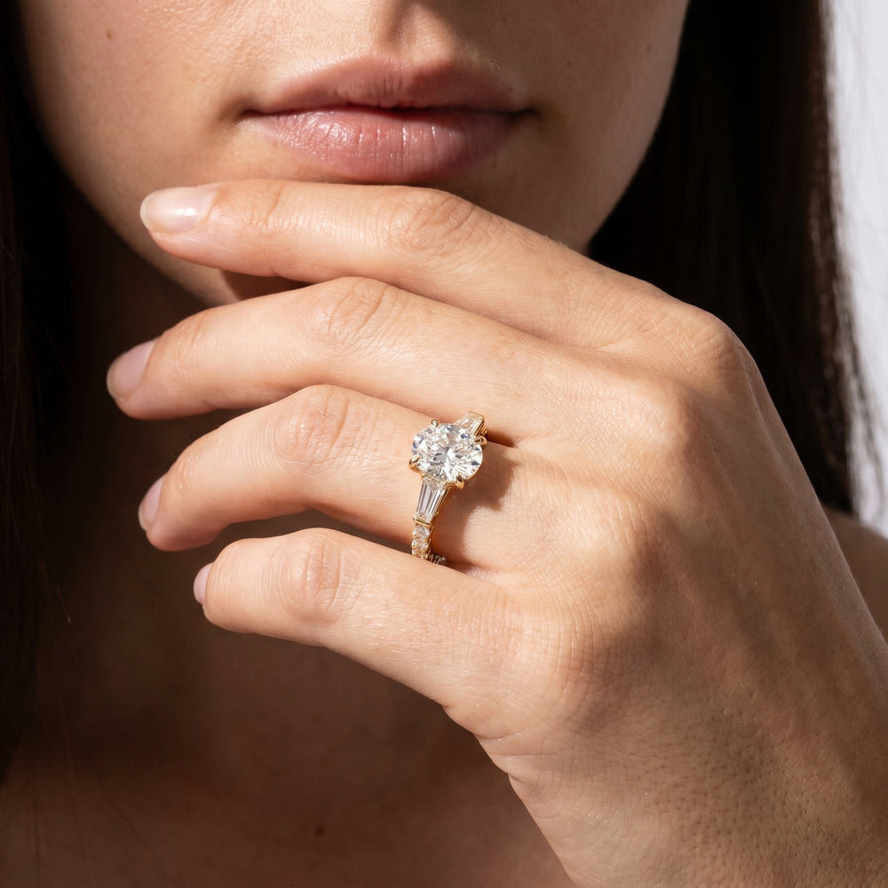 Arc Baguette Engagement Ring with Emerald Cut Diamond in 14KT Rose Gold view 2
