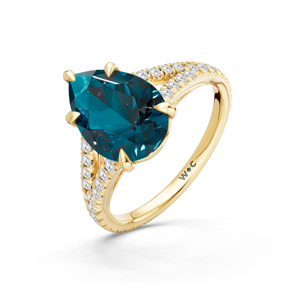 The Celestia Ring with Created London Blue Topaz Cut Diamond in 14KT Yellow Gold view 3
