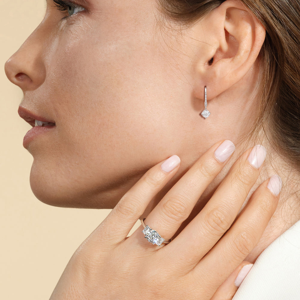 Model Wearing Studded Leverback Round Kite Set Diamond Dangler Earrings view