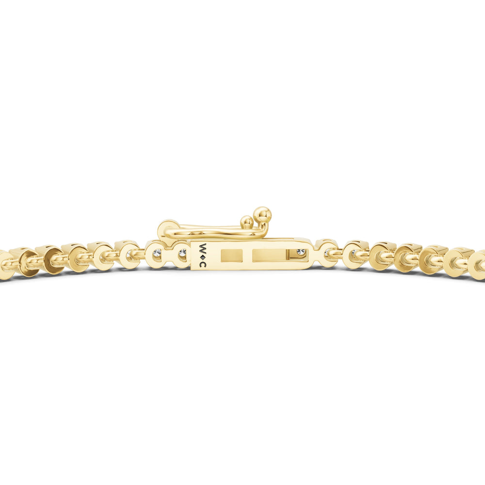 Petite Eternity Diamond Tennis Bracelet with 1 Cut Diamond in 14KT Yellow Gold view 5
