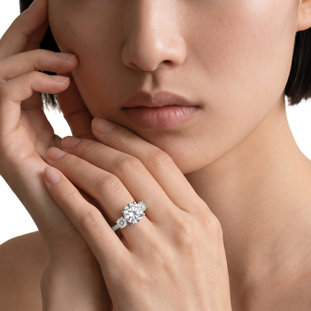 Three Stone Hidden Halo Cathedral Engagement Ring with Radiant Cut Diamond in 14KT Platinum view 2
