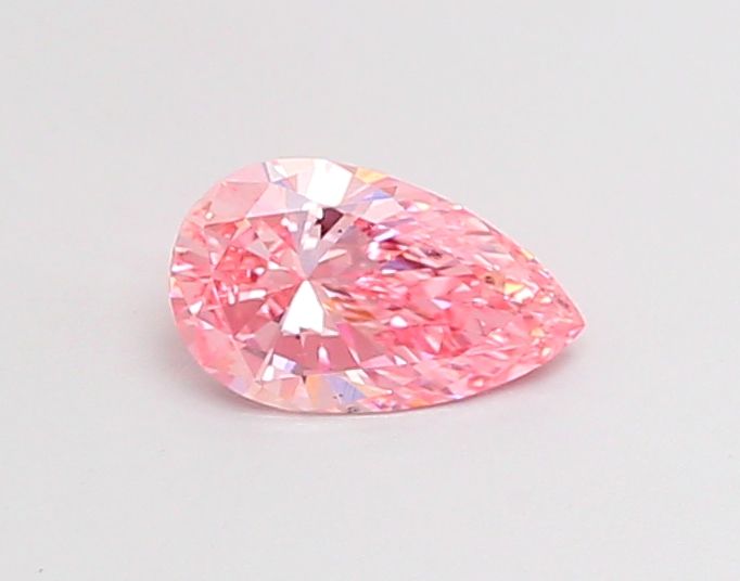 0.64 Carat Pear Lab Diamond with  Cut Diamond in 14KT  view 1

