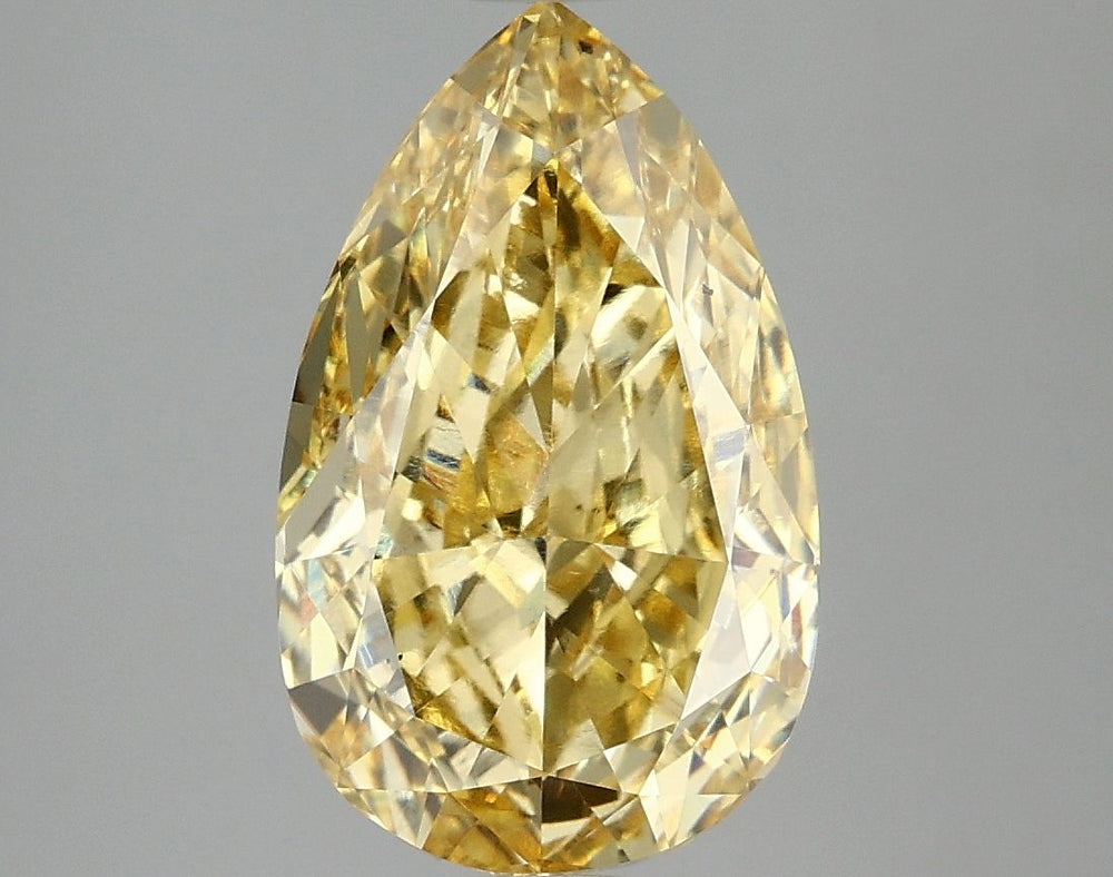 4.0 Carat Pear Lab Diamond with  Cut Diamond in 14KT  view 1

