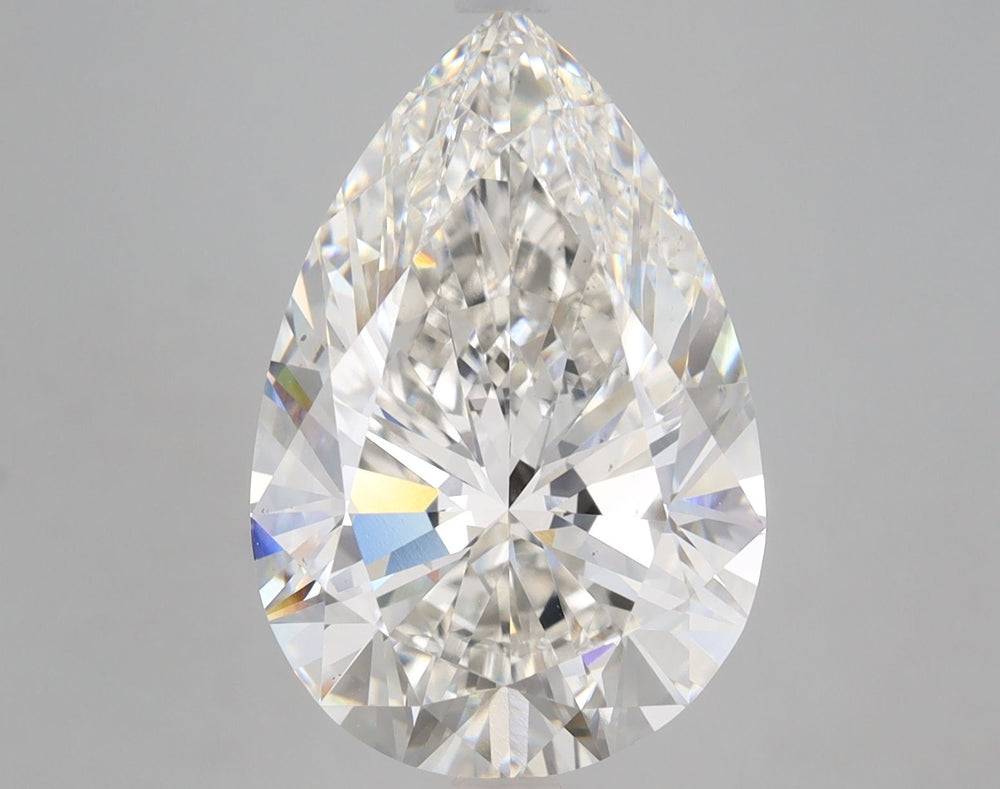 7.51 Carat Pear Lab Diamond with  Cut Diamond in 14KT  view 1
