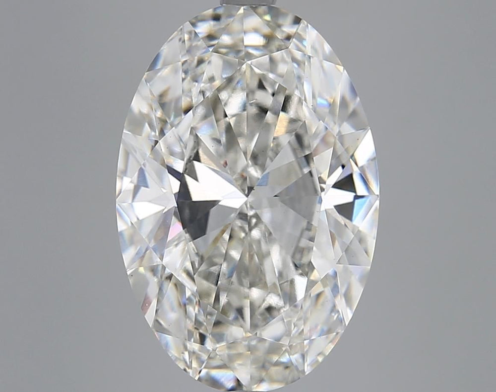 5.6 Carat Oval Lab Diamond with  Cut Diamond in 14KT  view 1
