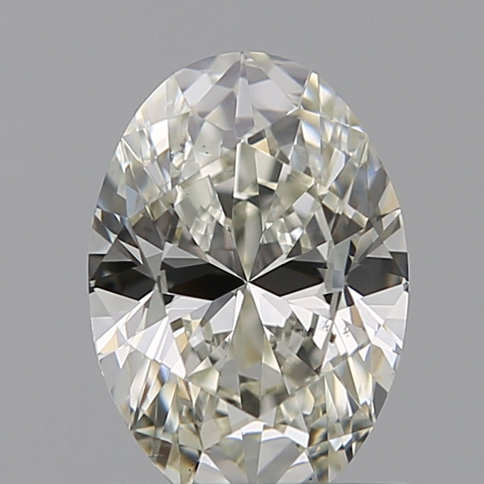 0.81 Carat Oval Natural Diamond with  Cut Diamond in 14KT  view 1

