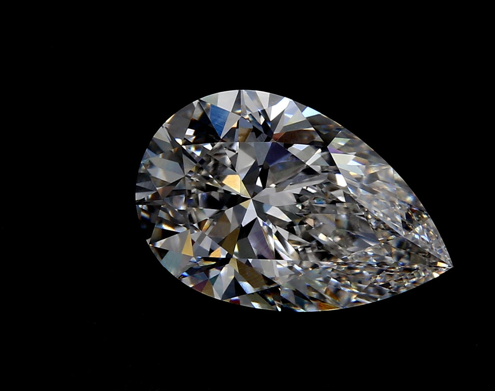 1.09 Carat Pear Lab Diamond with  Cut Diamond in 14KT  view 1
