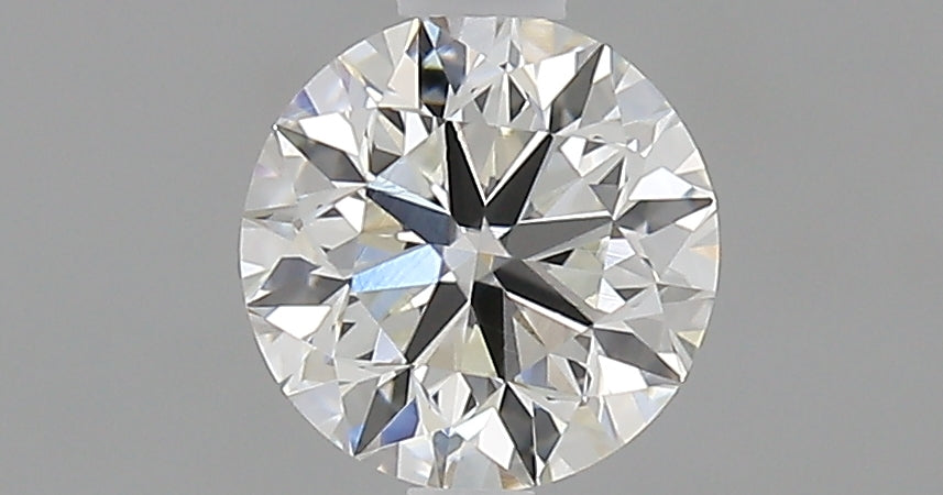 0.7 Carat Round Natural Diamond with  Cut Diamond in 14KT  view 1
