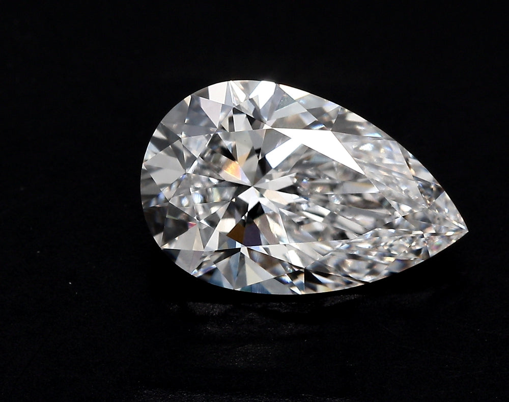1.42 Carat Pear Lab Diamond with  Cut Diamond in 14KT  view 1

