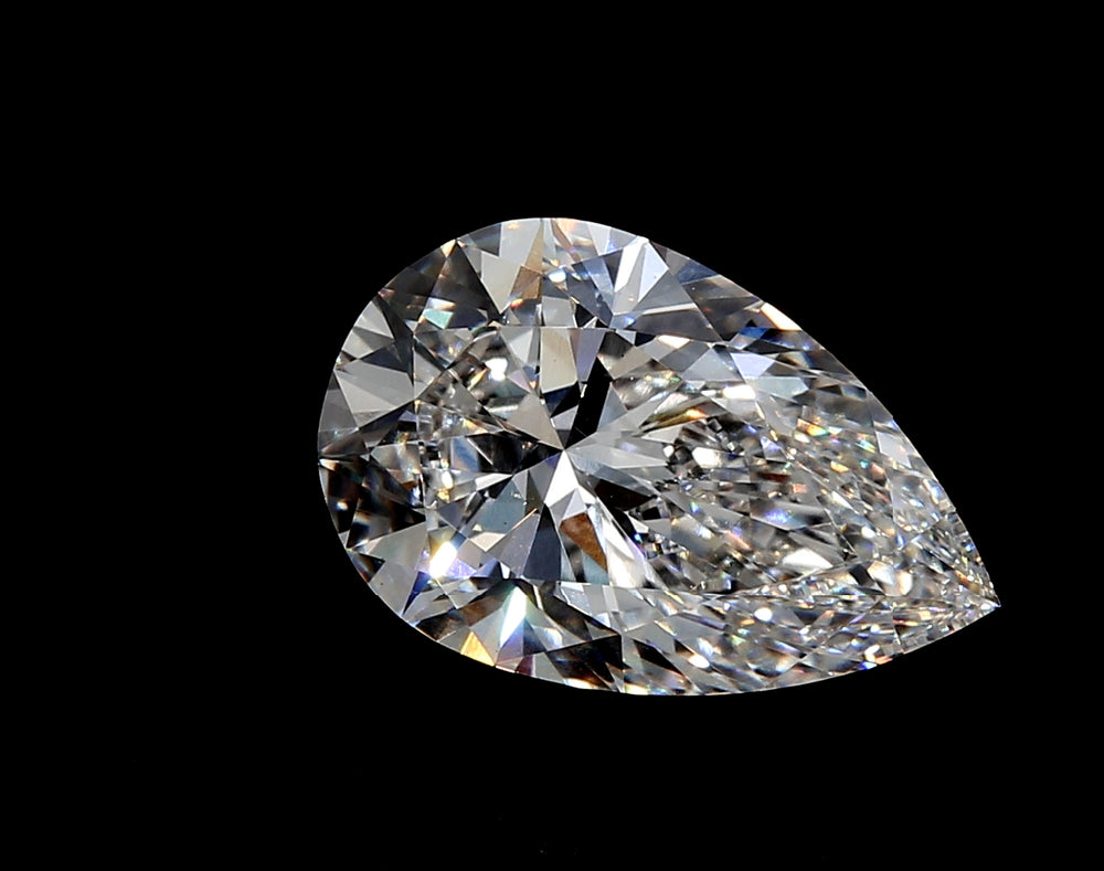 3.2 Carat Pear Lab Diamond with  Cut Diamond in 14KT  view 1
