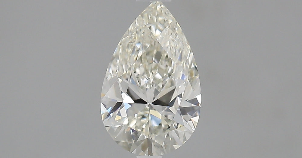 1.0 Carat Pear Natural Diamond with  Cut Diamond in 14KT  view 1
