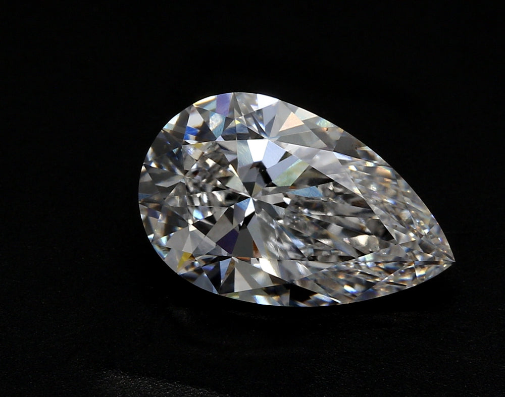 3.75 Carat Pear Lab Diamond with  Cut Diamond in 14KT  view 1
