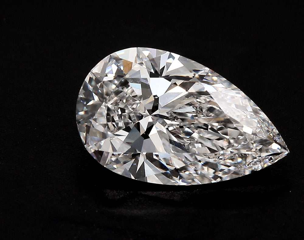 1.5 Carat Pear Lab Diamond with  Cut Diamond in 14KT  view 1
