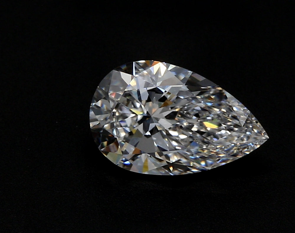 4.06 Carat Pear Lab Diamond with  Cut Diamond in 14KT  view 1
