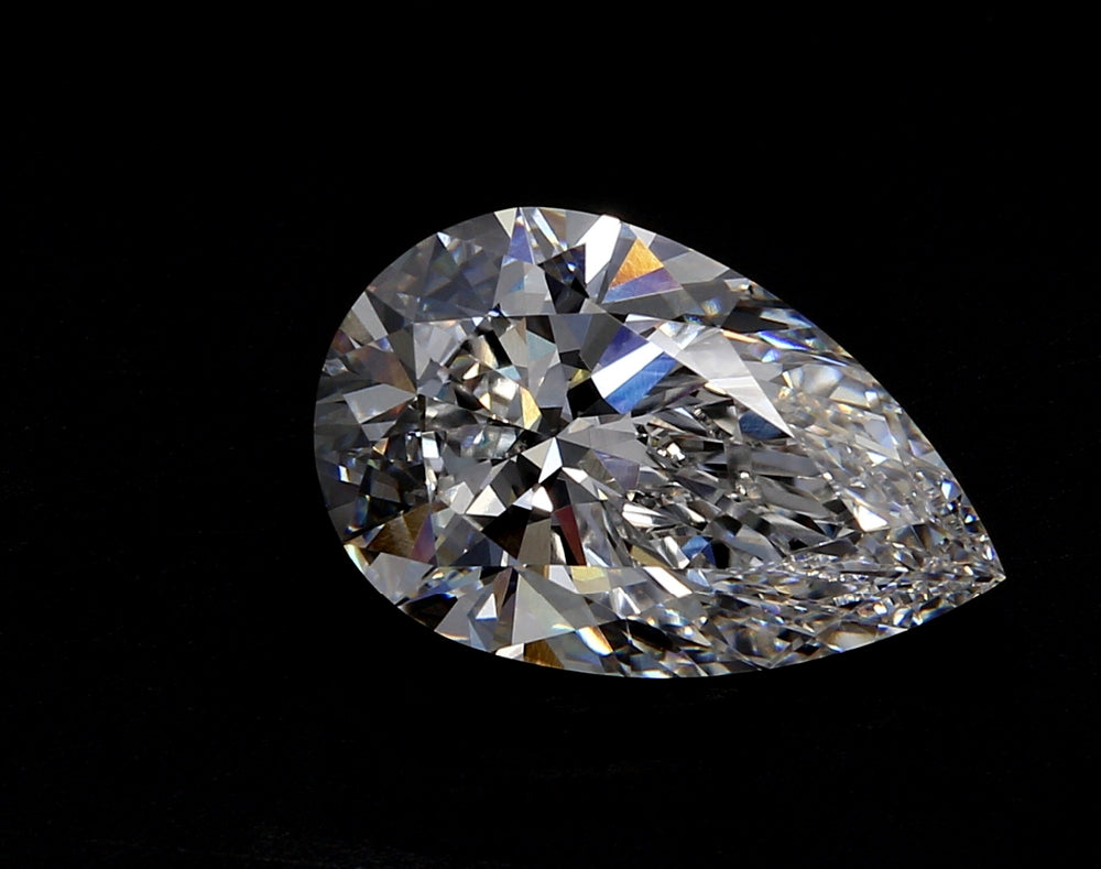 3.21 Carat Pear Lab Diamond with  Cut Diamond in 14KT  view 1
