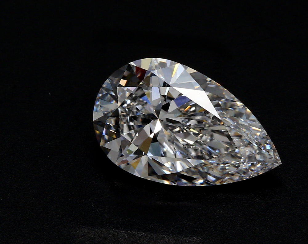 4.04 Carat Pear Lab Diamond with  Cut Diamond in 14KT  view 1
