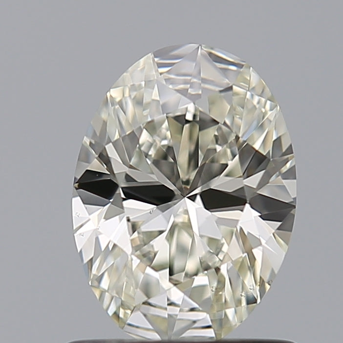 0.75 Carat Oval Natural Diamond with  Cut Diamond in 14KT  view 1
