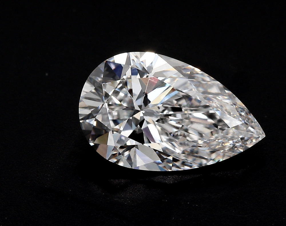4.01 Carat Pear Lab Diamond with  Cut Diamond in 14KT  view 1
