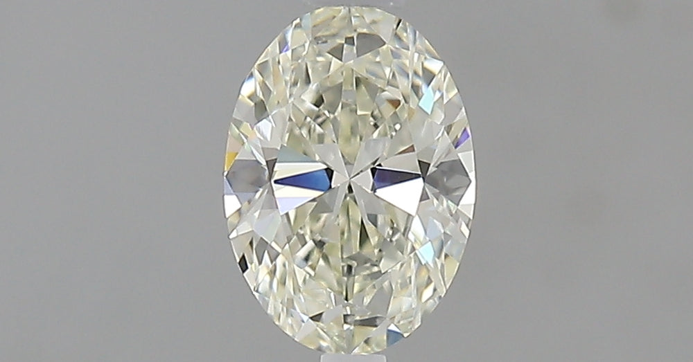 0.62 Carat Oval Natural Diamond with  Cut Diamond in 14KT  view 1
