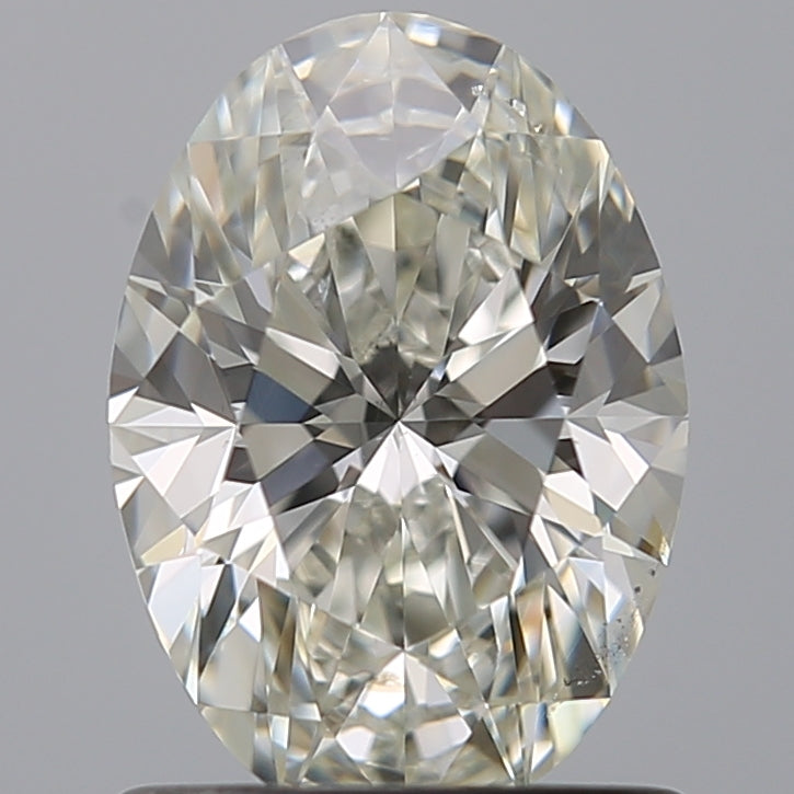 1.01 Carat Oval Natural Diamond with  Cut Diamond in 14KT  view 1
