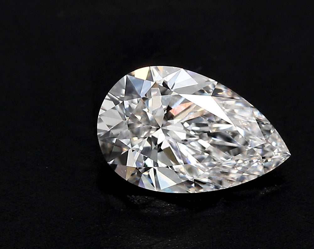 3.63 Carat Pear Lab Diamond with  Cut Diamond in 14KT  view 1
