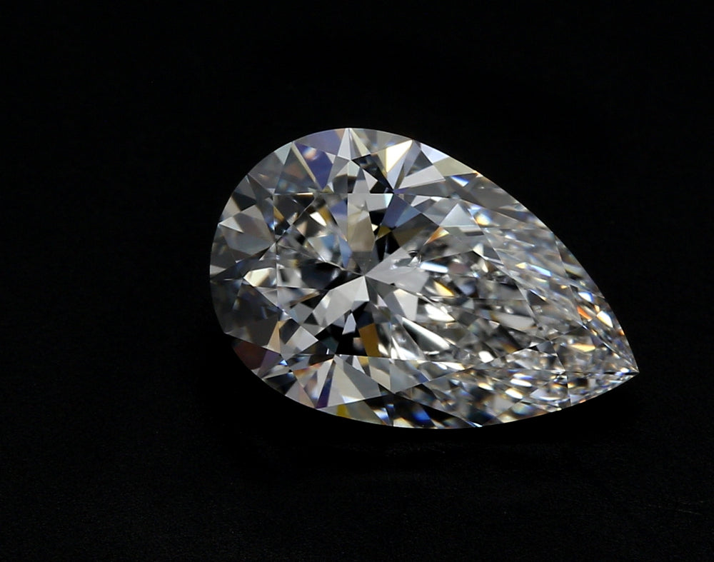 3.8 Carat Pear Lab Diamond with  Cut Diamond in 14KT  view 1
