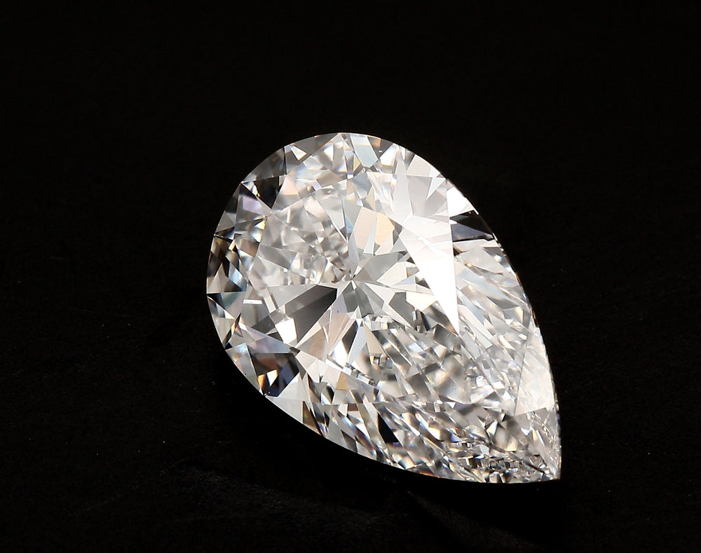 4.09 Carat Pear Lab Diamond with  Cut Diamond in 14KT  view 1
