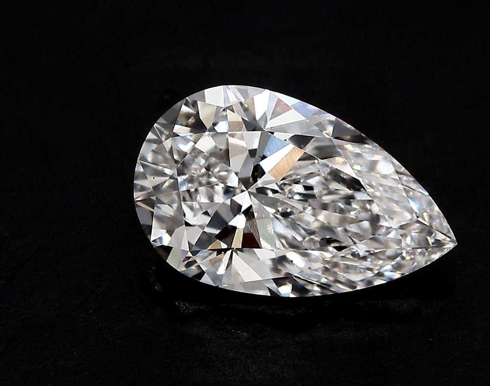 3.19 Carat Pear Lab Diamond with  Cut Diamond in 14KT  view 1

