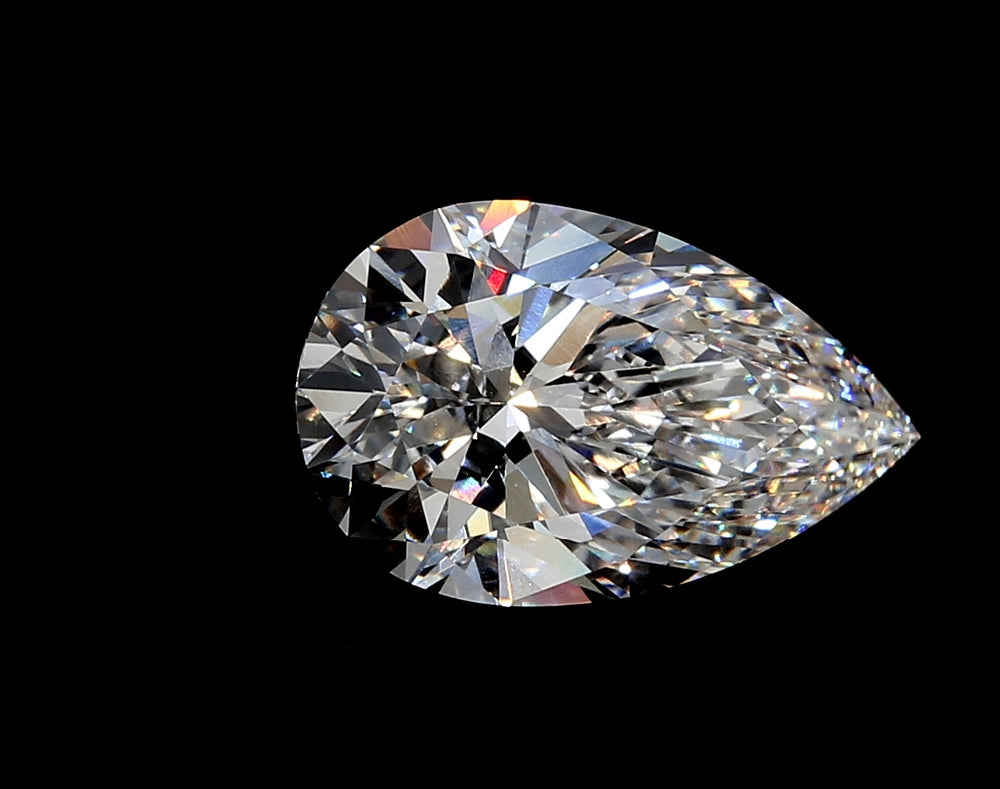 3.56 Carat Pear Lab Diamond with  Cut Diamond in 14KT  view 1
