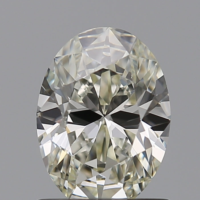 0.82 Carat Oval Natural Diamond with  Cut Diamond in 14KT  view 1
