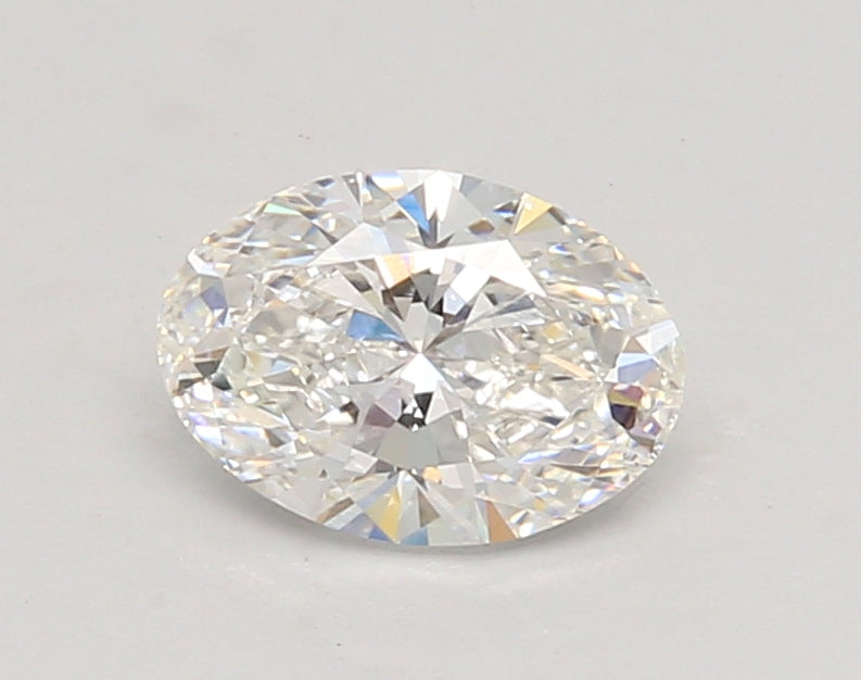0.84 Carat Oval Lab Diamond with  Cut Diamond in 14KT  view 1
