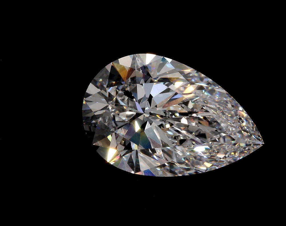 3.08 Carat Pear Lab Diamond with  Cut Diamond in 14KT  view 1
