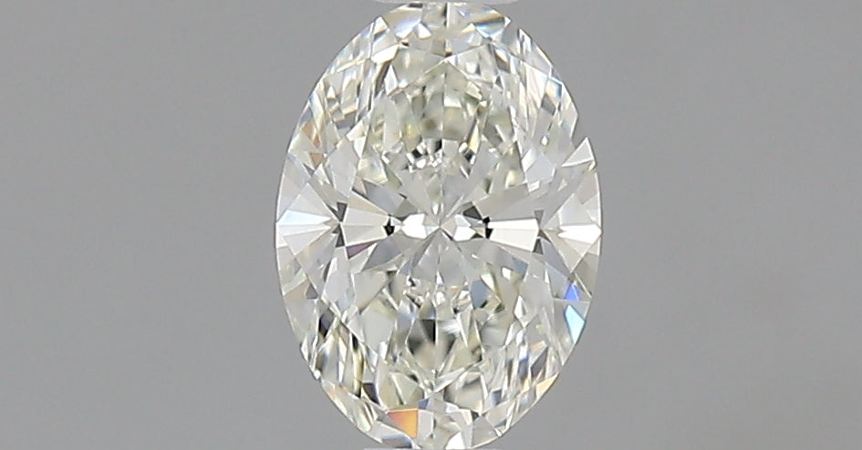 0.5 Carat Oval Natural Diamond with  Cut Diamond in 14KT  view 1
