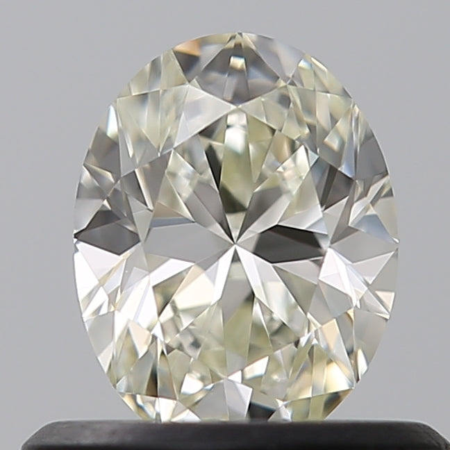 0.5 Carat Oval Natural Diamond with  Cut Diamond in 14KT  view 1
