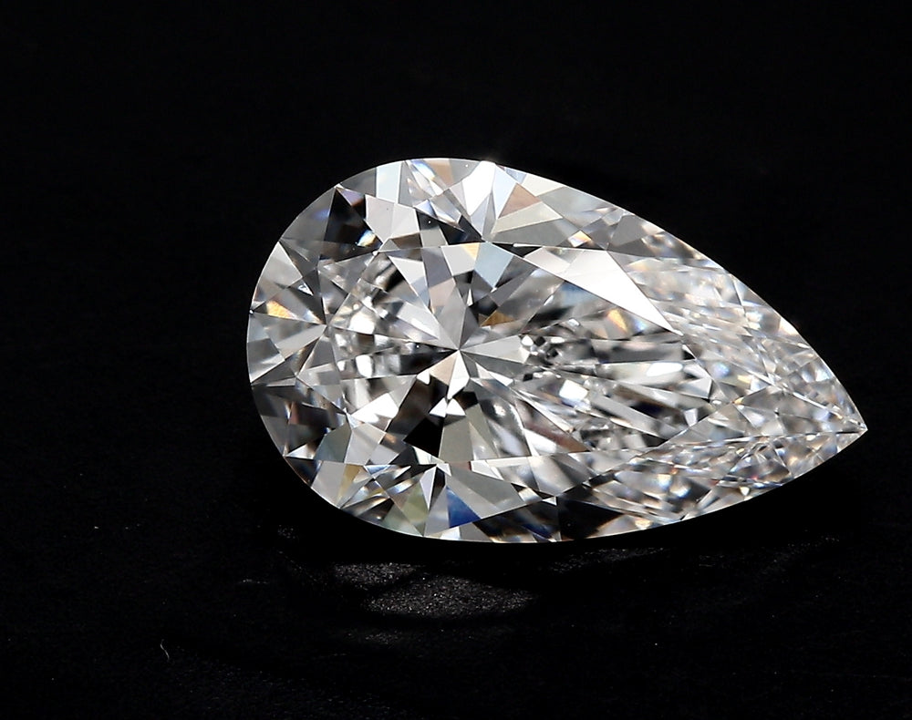 3.55 Carat Pear Lab Diamond with  Cut Diamond in 14KT  view 1

